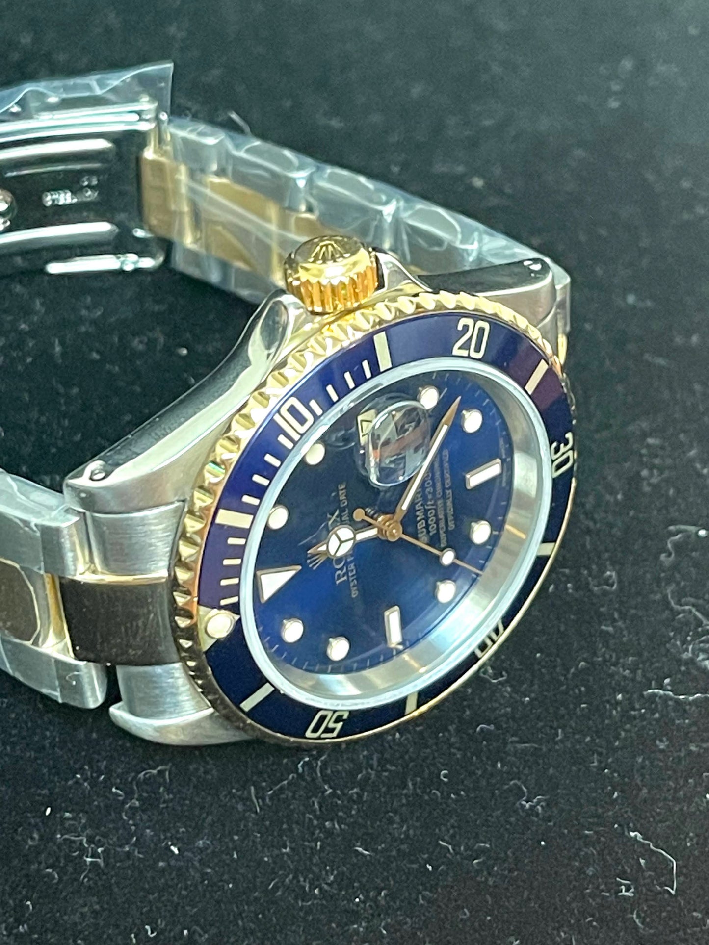 2000 Rolex Mens Submariner 16613 Blue Dial Gold Through TT Oyster W Paper 40mm